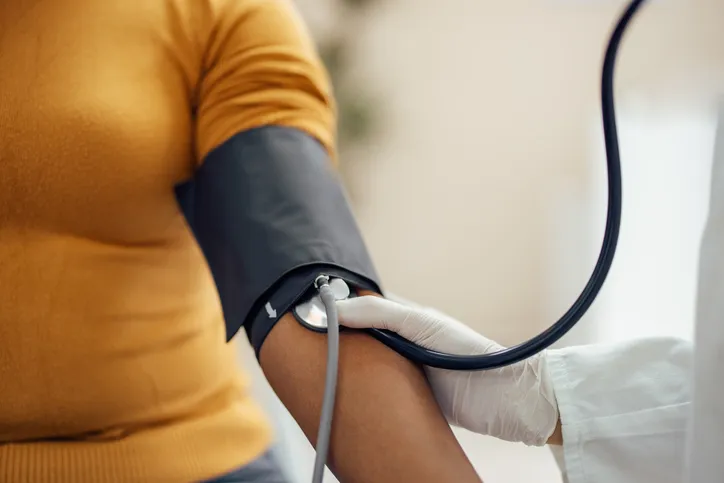 woman getting blood pressure taken at EVMS Family medicine