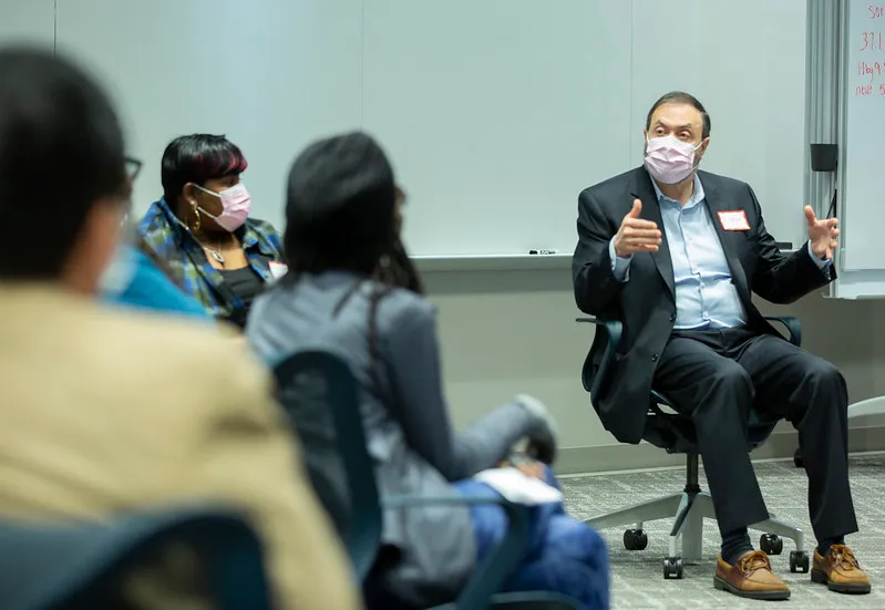 Dr. Abuhamad talking with a group