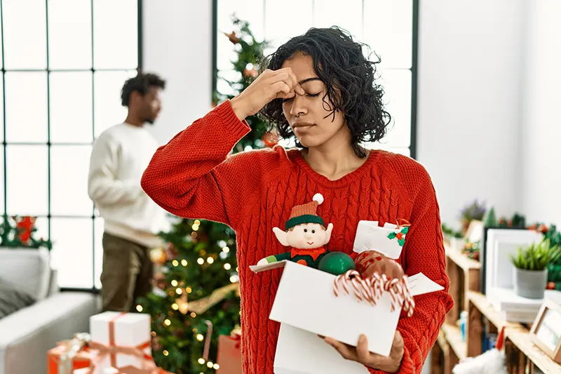 woman stressed out in holiday outfit