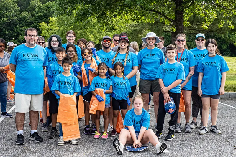 group of volunteers at service event outdoors.