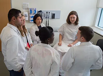 MD students work with standardized patients