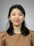 A female doctor posing for a photograph