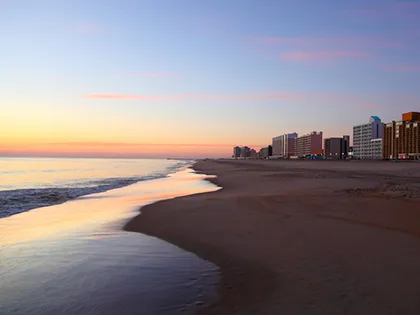 Virginia Beach Oceanfront skyline at dusk