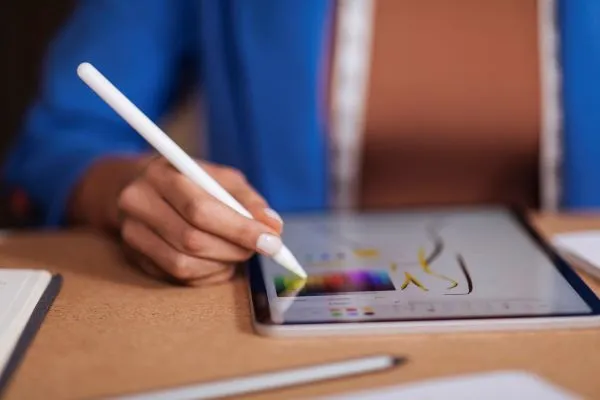 Person designing on a tablet