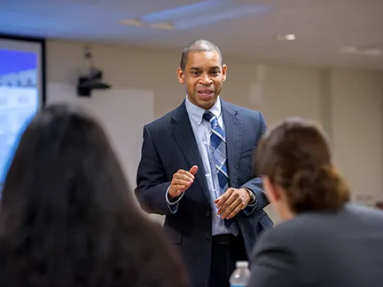 Dr. Thomas Kimble speaks to students.