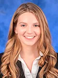 Elizabeth Miller smiles at the camera