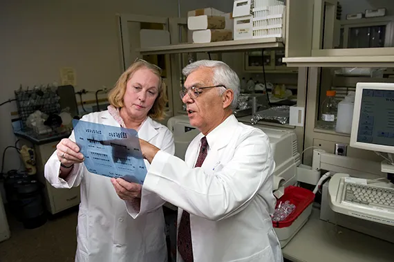 Dr. Gerald Pepe and Marcia Burch in the lab.