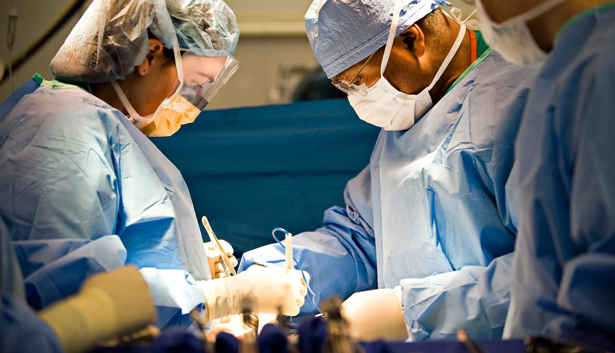 Dr. Britt and a team of EVMS surgeons operate on a patient.