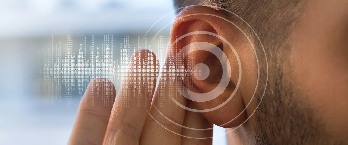 A man holds his hand up behind his ear as if listening. Transparent light gray sound wave graphics cover the image.