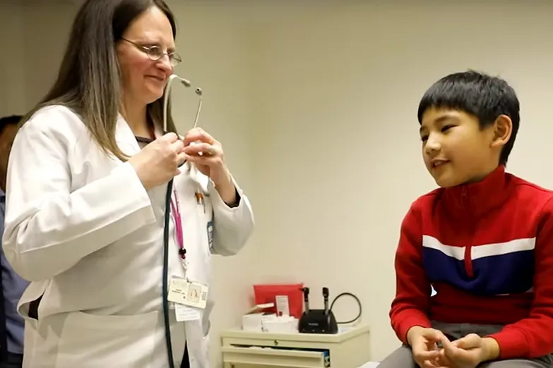 A doctor with a child patient