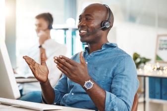 Man with headphones talking on the phone