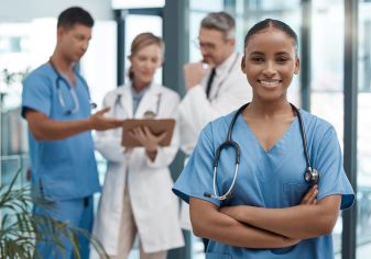 Doctor, team and portrait of black woman in the hospital or clinic and smile on face