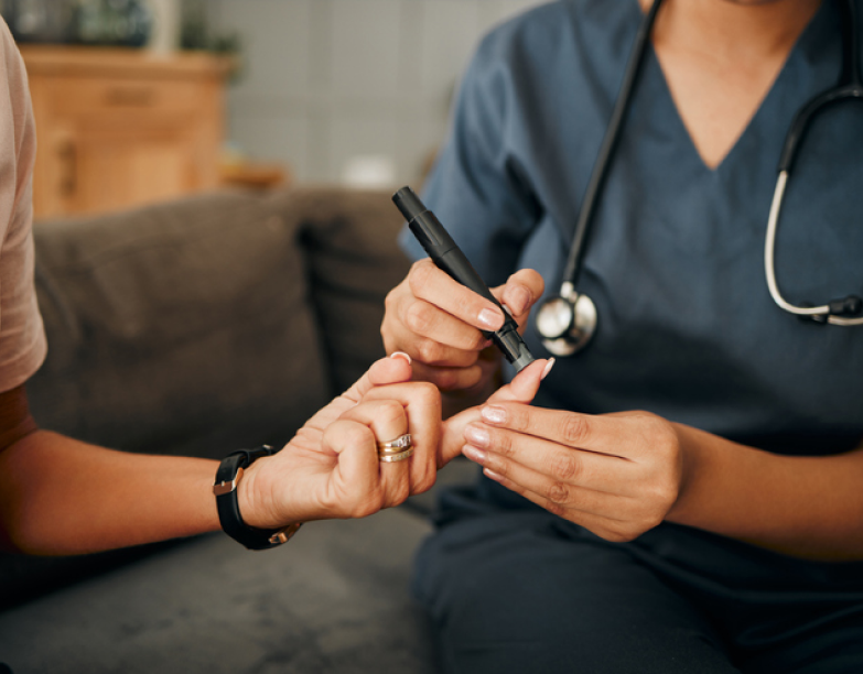 TitleDiabetes, hands of nurse and blood sugar test on patient finger in home visit.